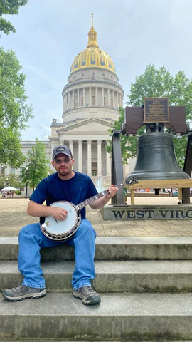 Hunter Lemon playing a Lemon Banjo at the West Virginia State Capitol in Charleston, WV